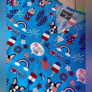 UA red white and cool turquoise women’s V-neck print scrub top